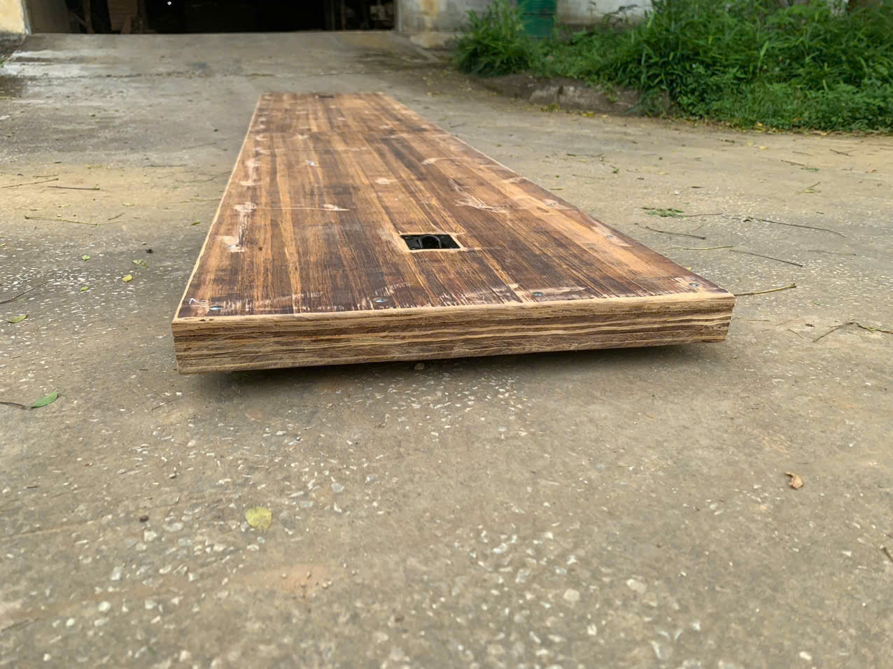 Finished bamboo composite access mat, showing solid lamination through the full thickness
